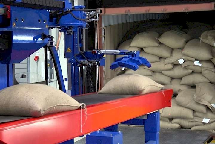 Unloading a container with jute bags
