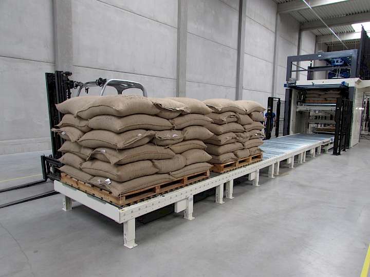 Pallets with jute bags ready for storage or transport